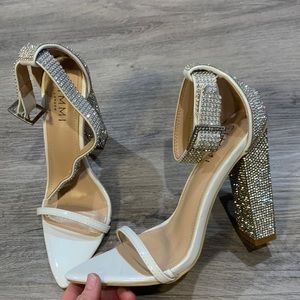 Pointed white rhinestone heels